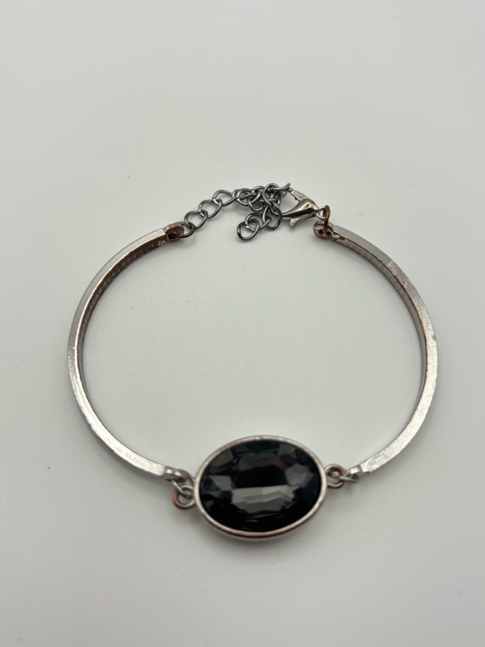 Silver-Tone Bracelet with Black Oval Stone